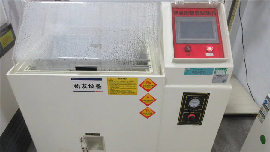 Salt spray corrosion testing of stainless steel bottle components and coated metal parts